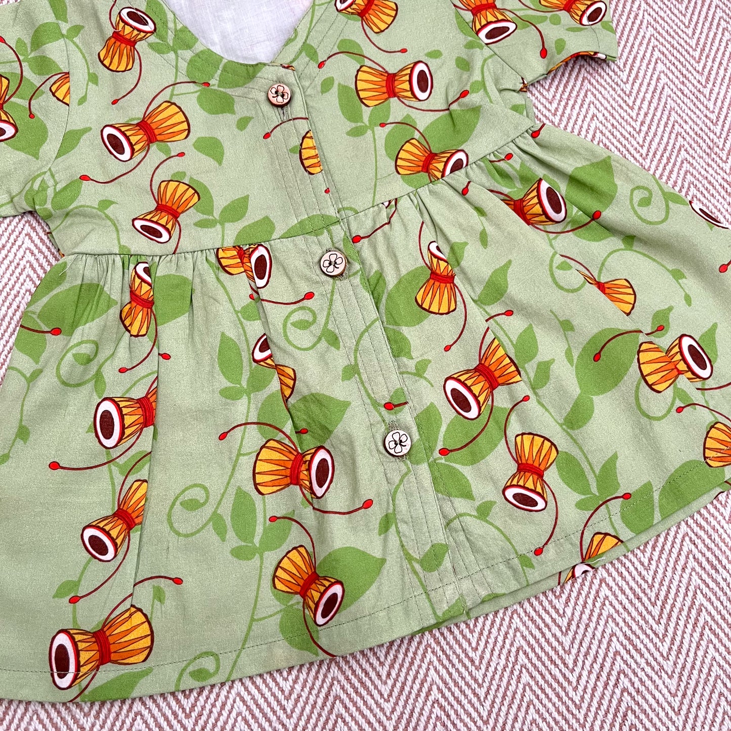 Mahashivratri special green coloured organic cotton Shiva's Damru print frock for infants, toddlers and kids-perfect for festive occasions