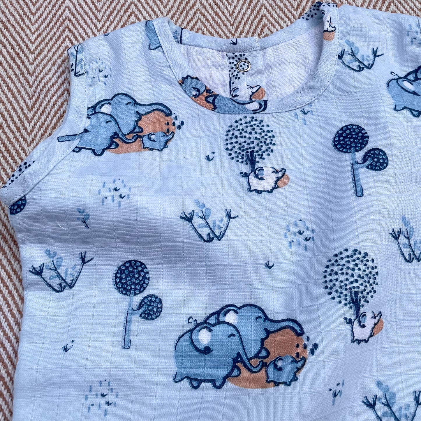 Elephant Clan Muslin Onesie
