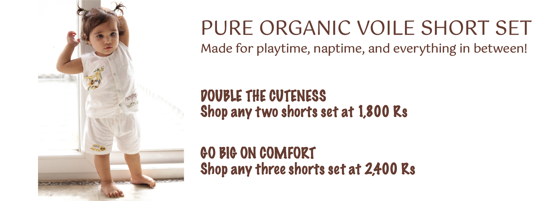 Chris standing up holding his daughter Elva