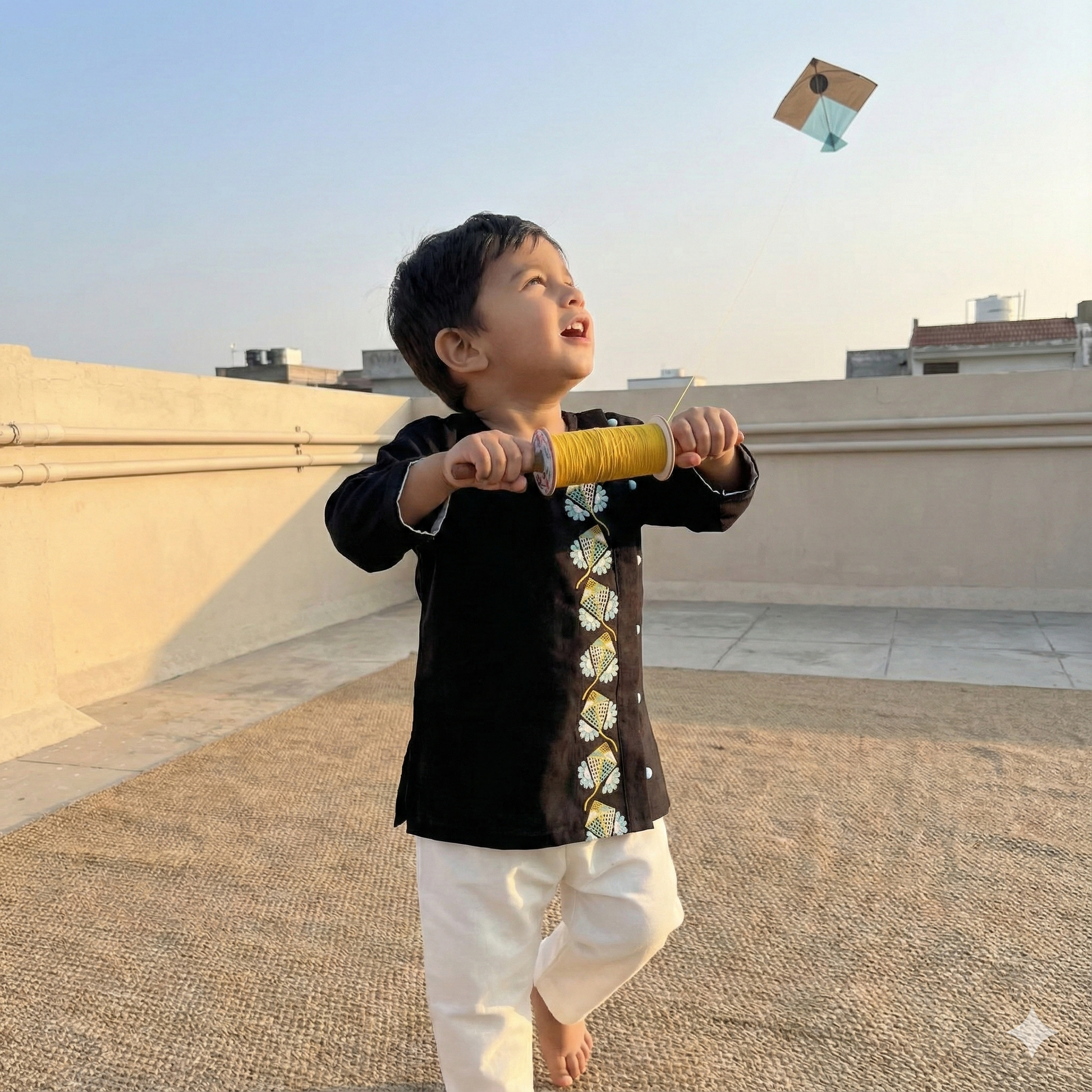 Sankranti special cotton slub black kites-embroidered kurta set for infants, toddlers and kids.