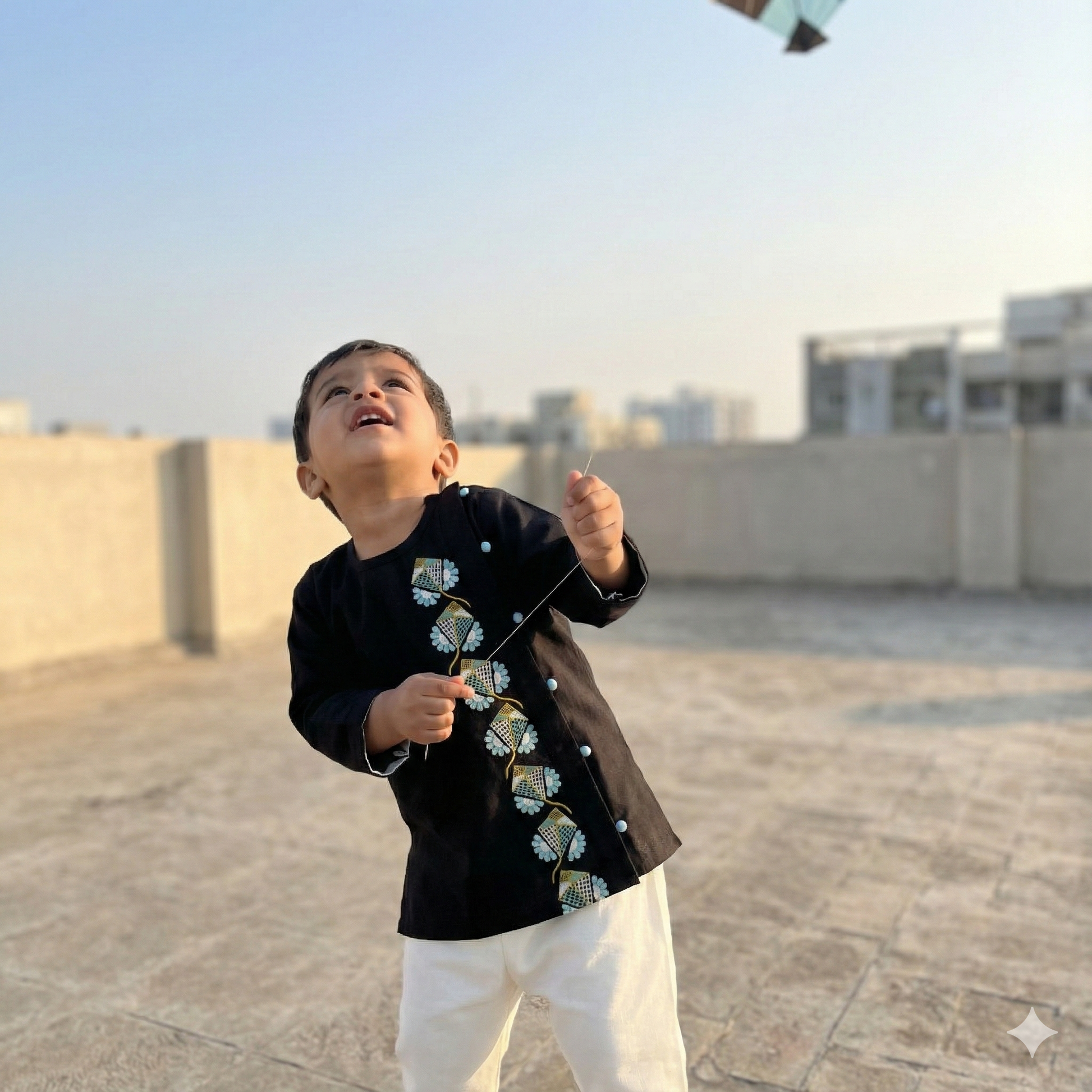 Sankranti special cotton slub black kites-embroidered kurta set for infants, toddlers and kids.