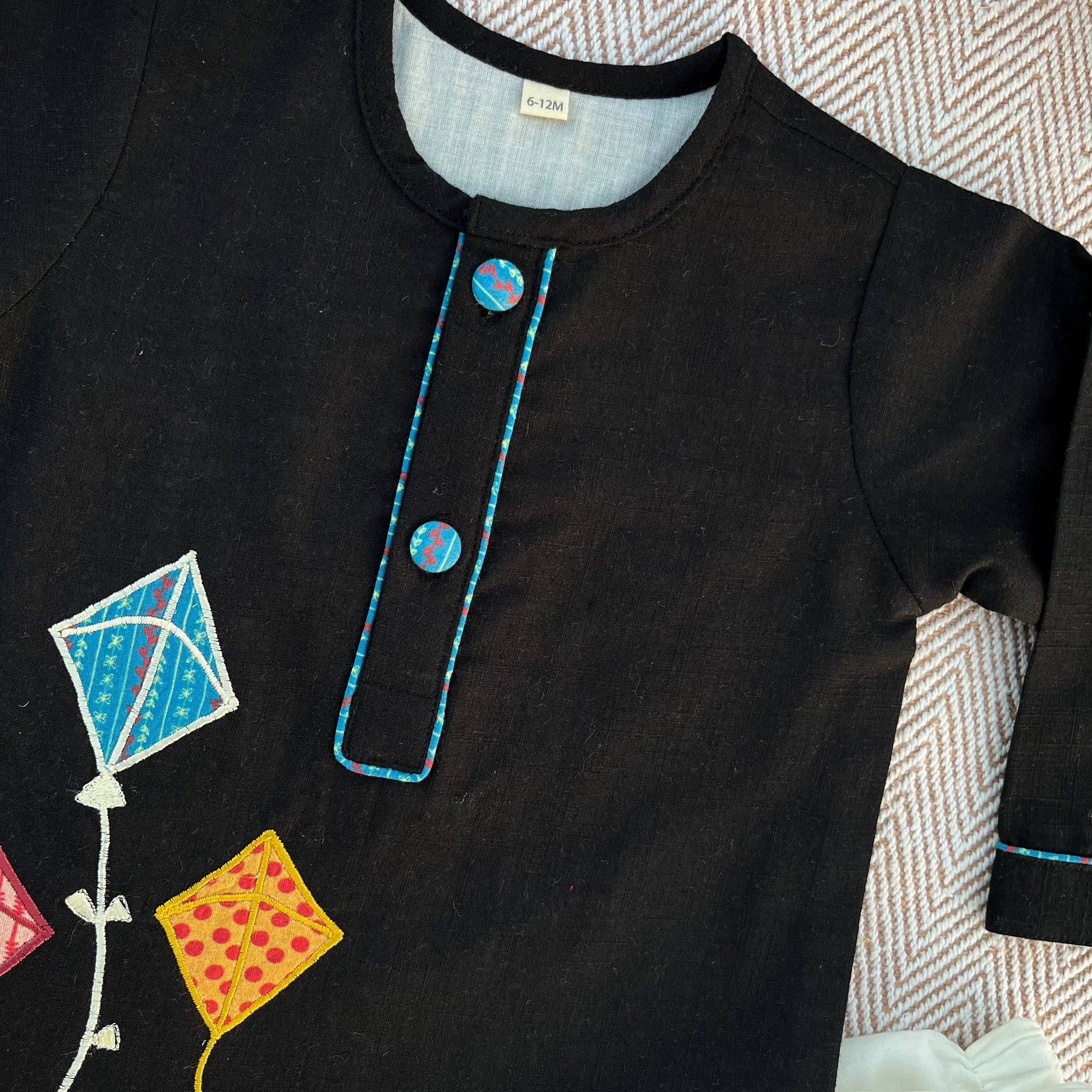 Sankranti special cotton slub black patchwork embroidered kite kurta set for infants, toddlers and kids.