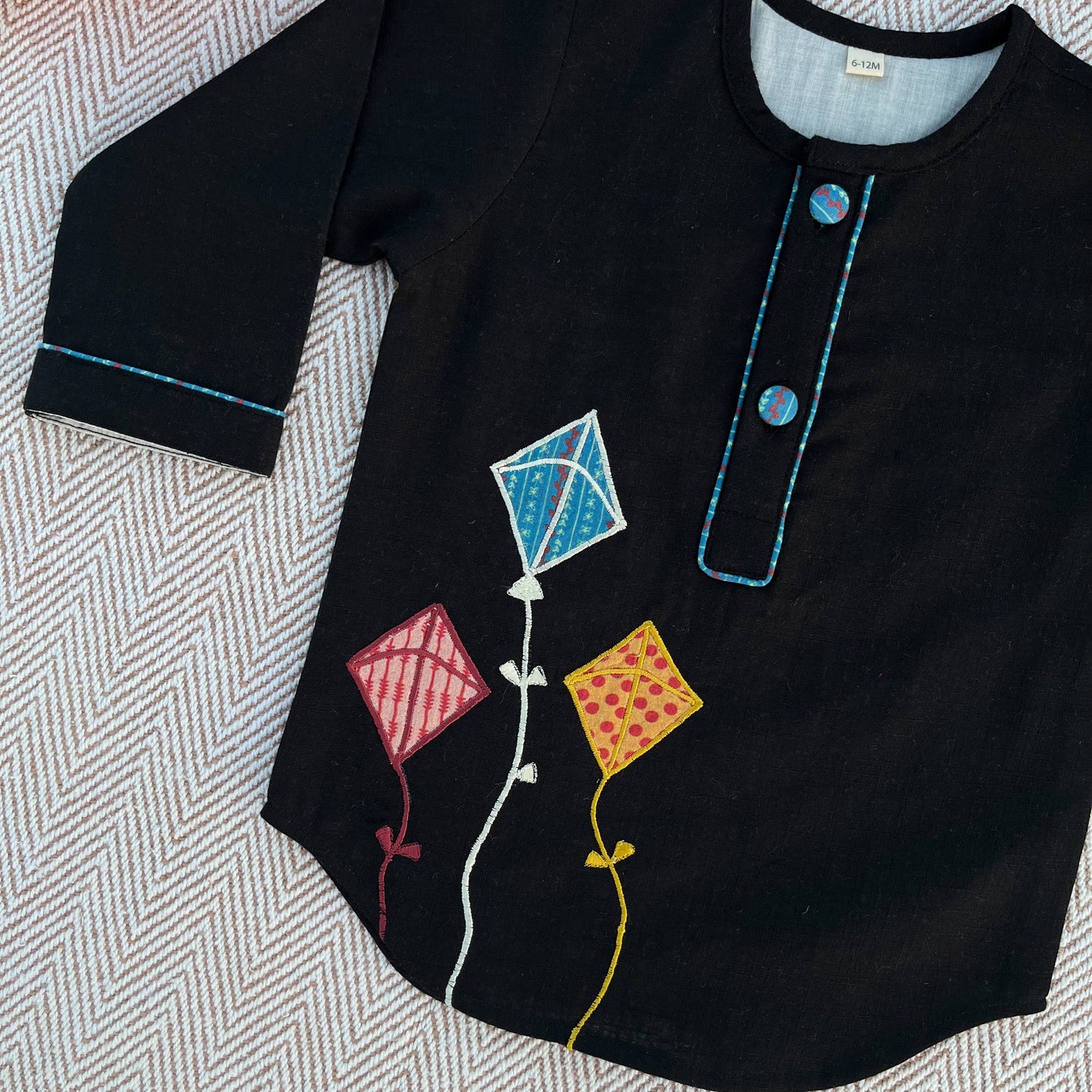 Sankranti special cotton slub black patchwork embroidered kite kurta for infants, toddlers and kids.