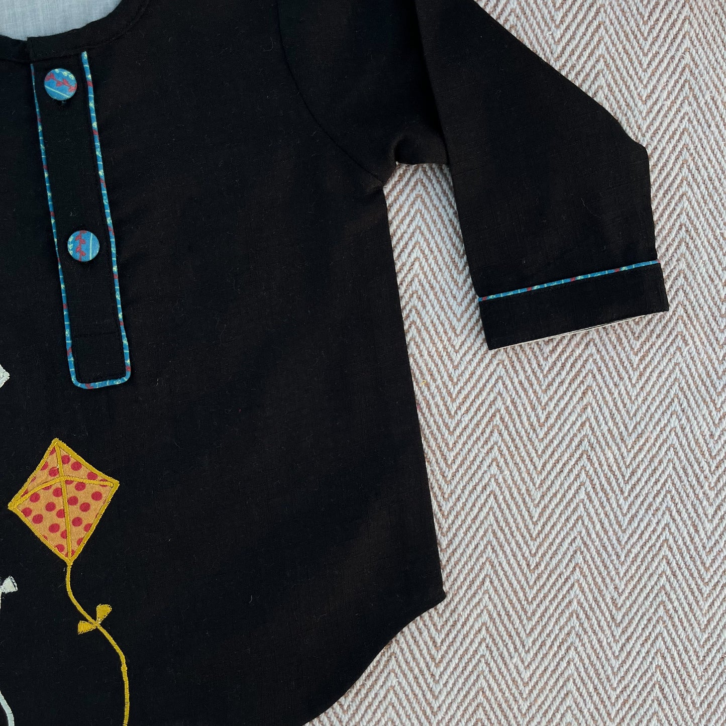 Sankranti special cotton slub black patchwork embroidered kite kurta for infants, toddlers and kids.