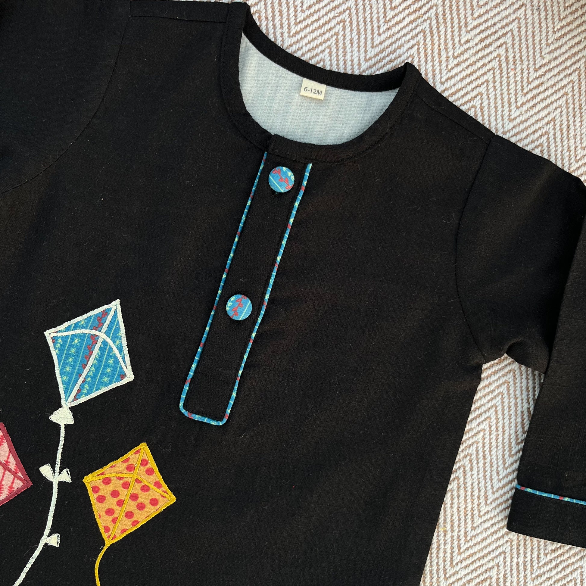 Sankranti special cotton slub black patchwork embroidered kite kurta for infants, toddlers and kids.