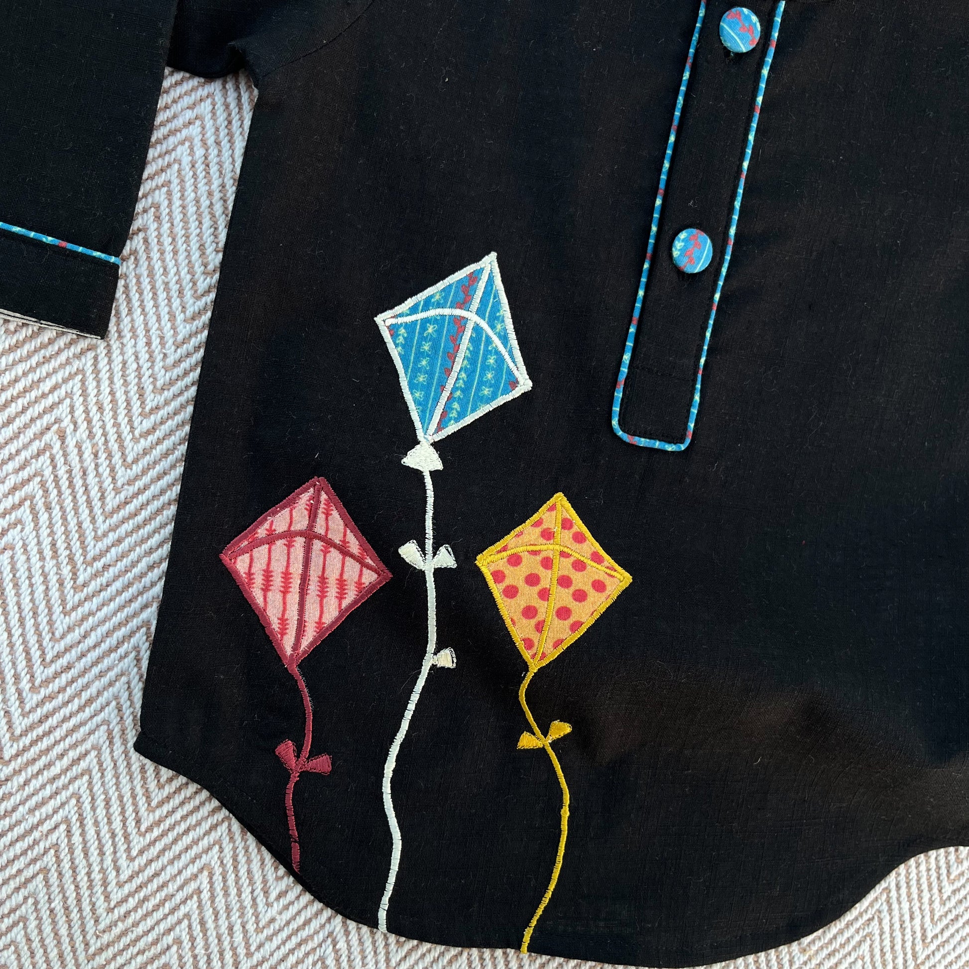 Sankranti special cotton slub black patchwork embroidered kite kurta set for infants, toddlers and kids.