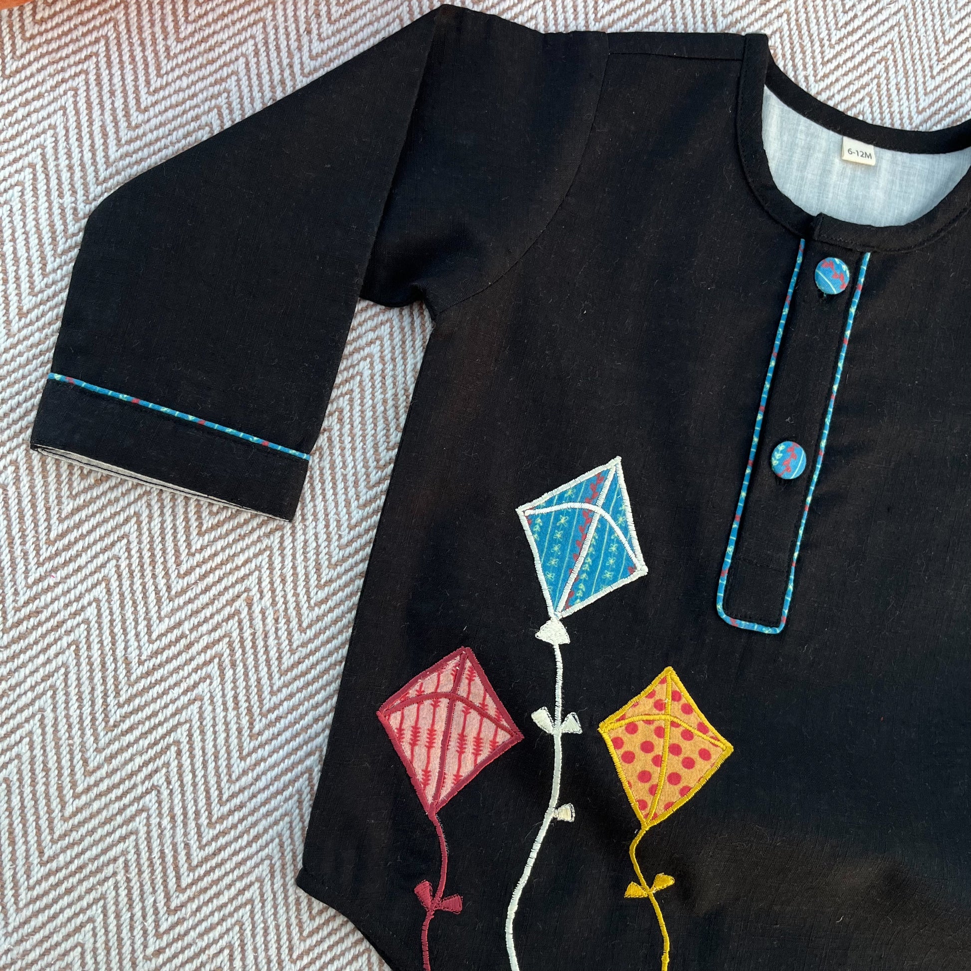 Sankranti special cotton slub black patchwork embroidered kite kurta set for infants, toddlers and kids.
